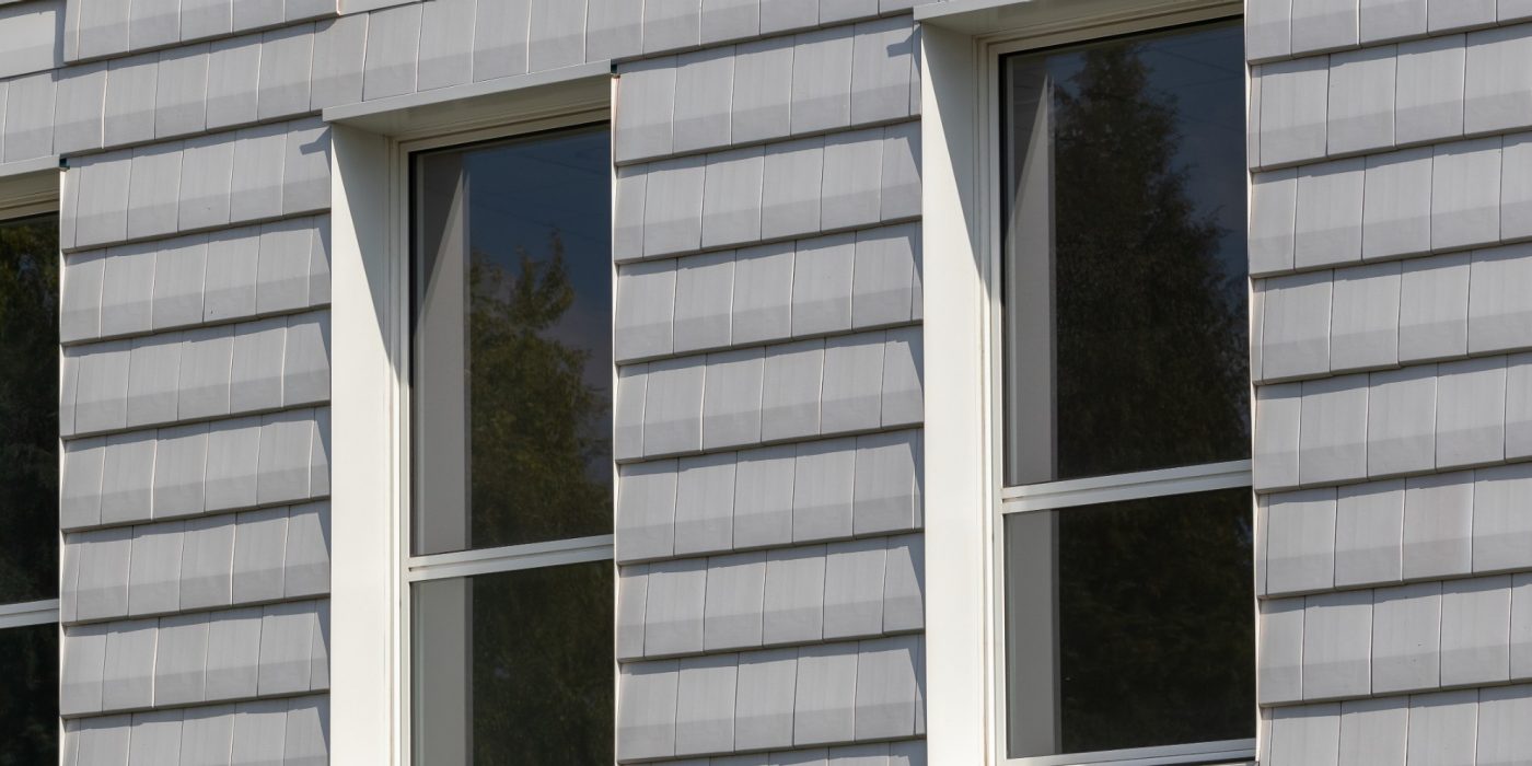 Logements Collectifs L’Etoffe à Villeneuve d'Ascq avec les tuiles Actua Blanc titane en bardage tuile terre cuite