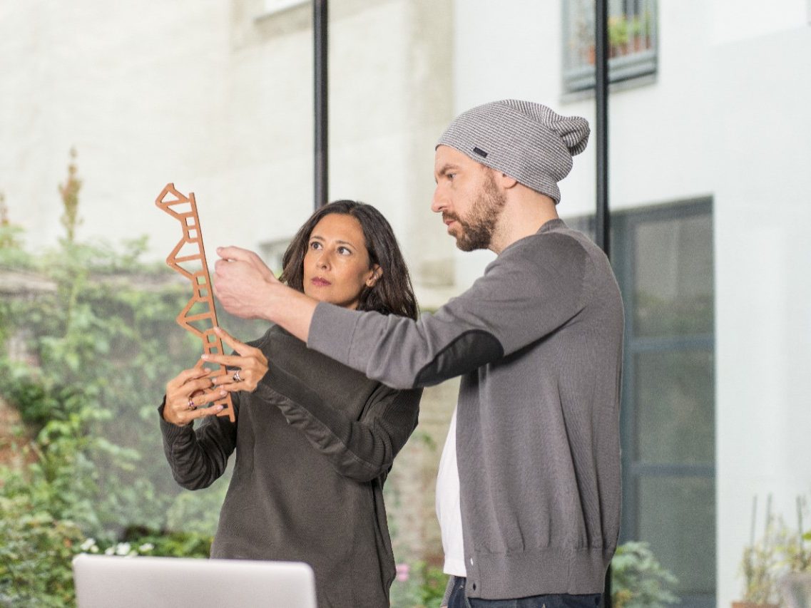Architects inspecting the profile of an Argeton façade element