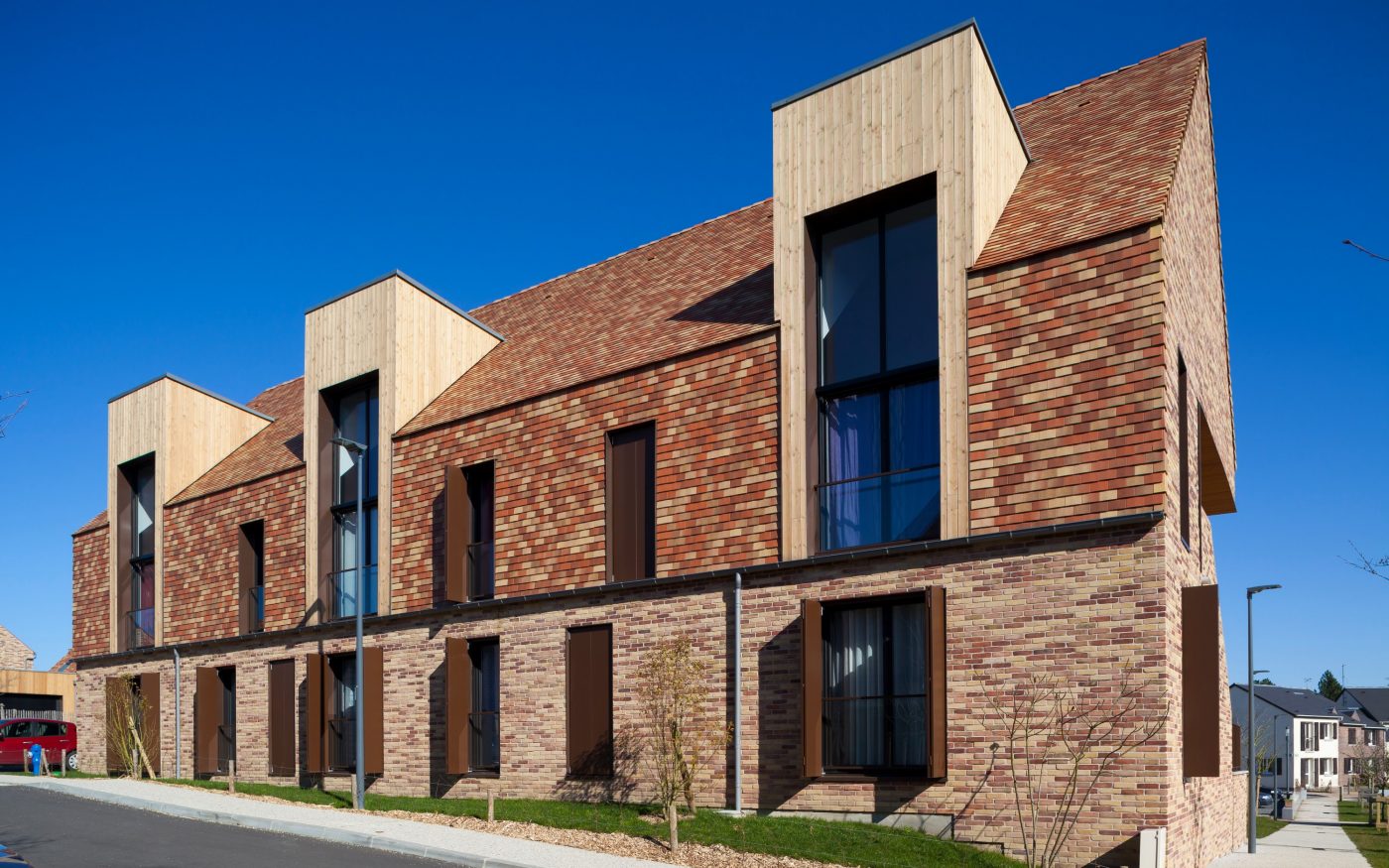 Logement Collectif Complex Le Carreau avec la tuile Tempo 18,5 x 31 Saint-Jean