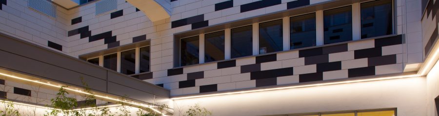 Espace public sur 4 étages. Rue Nationale 59000 Lille. Produits Argelite teintes  blanc carrare, gris basalte, gris métal.