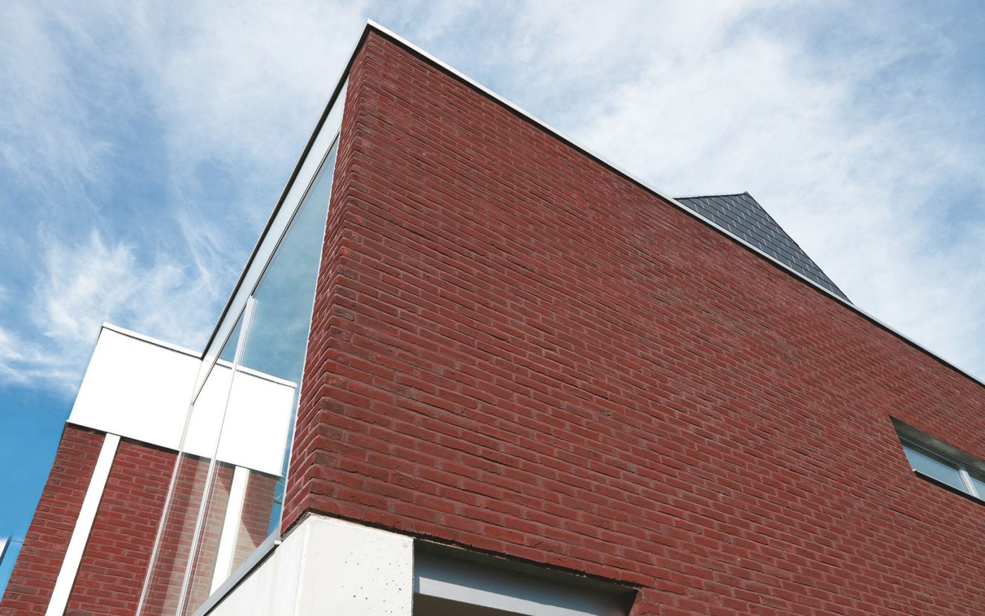 Maison individuelle à Saint-Amands en Belgique avec la brique Agora Lie-de-vin