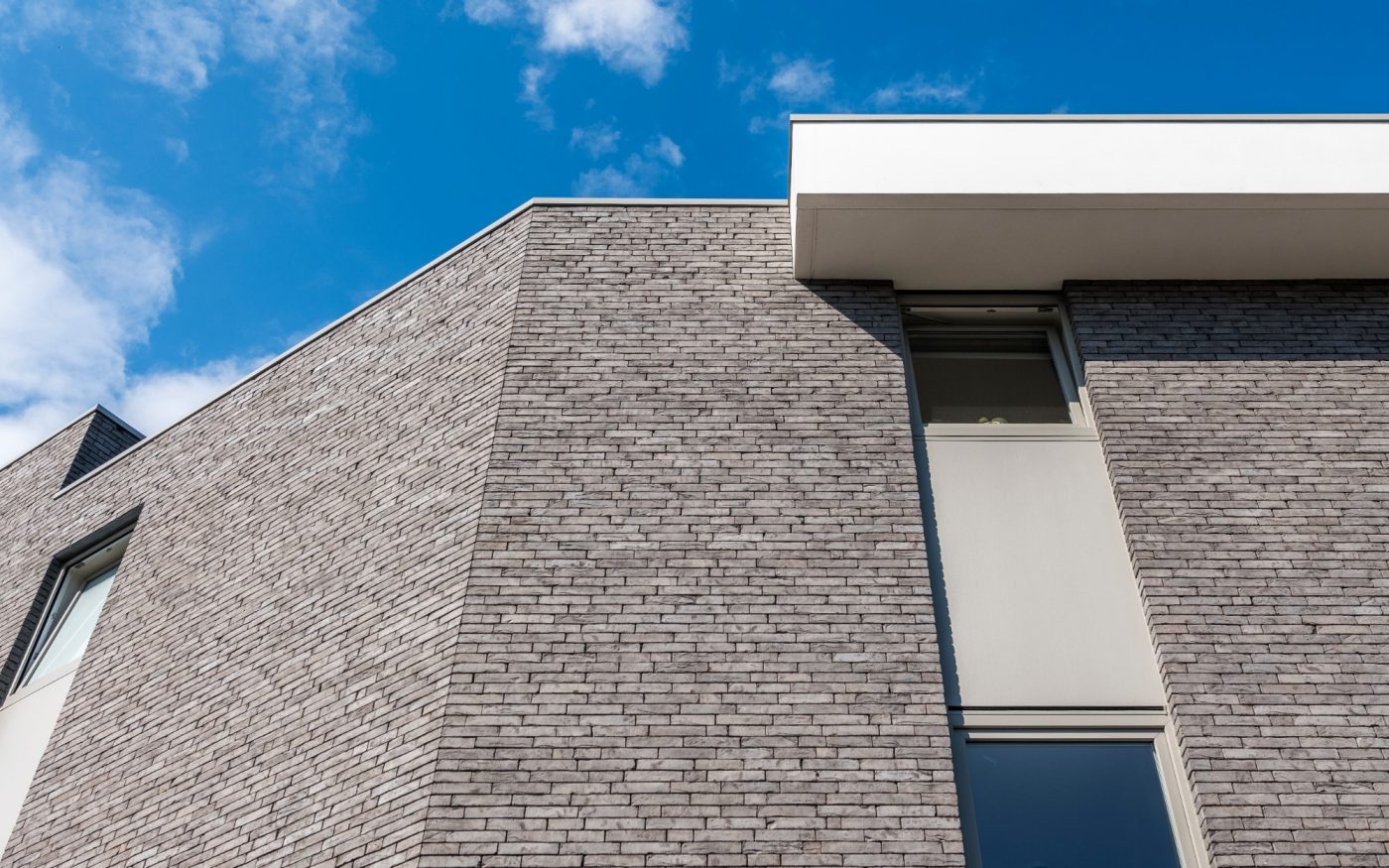 Logement collectif à Olsene avec la brique Imperium Iluzo nerus