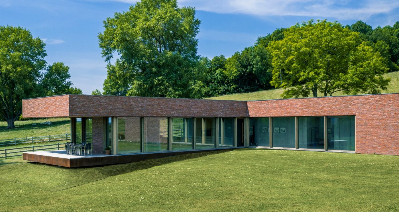 photo d'une Maison individuelle à Frasnez-les-Buissenal, en Belgique avec la collection Metropolis Rouge aula Eco-brick