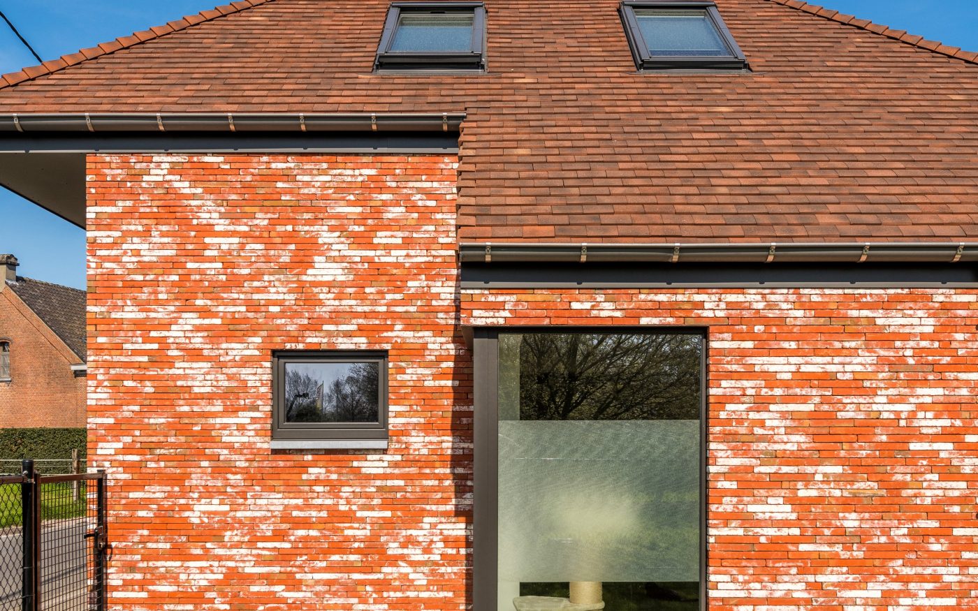 Photo d'une nouvelle construction à Melsele en Belgique avec Métropolis Rouge Atrium Eco-brick