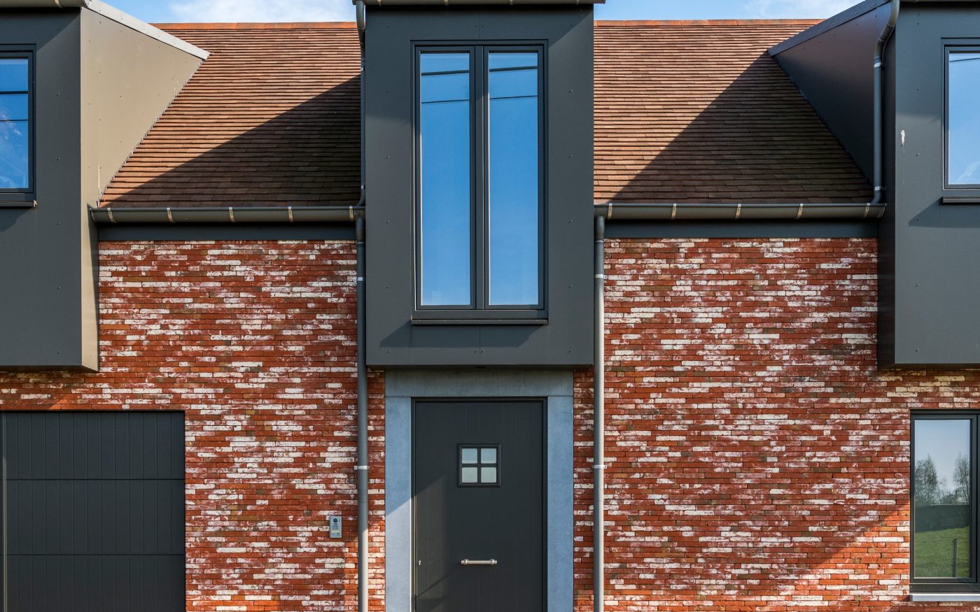 Photo d'une nouvelle construction à Melsele en Belgique avec Métropolis Rouge Atrium Eco-brick
