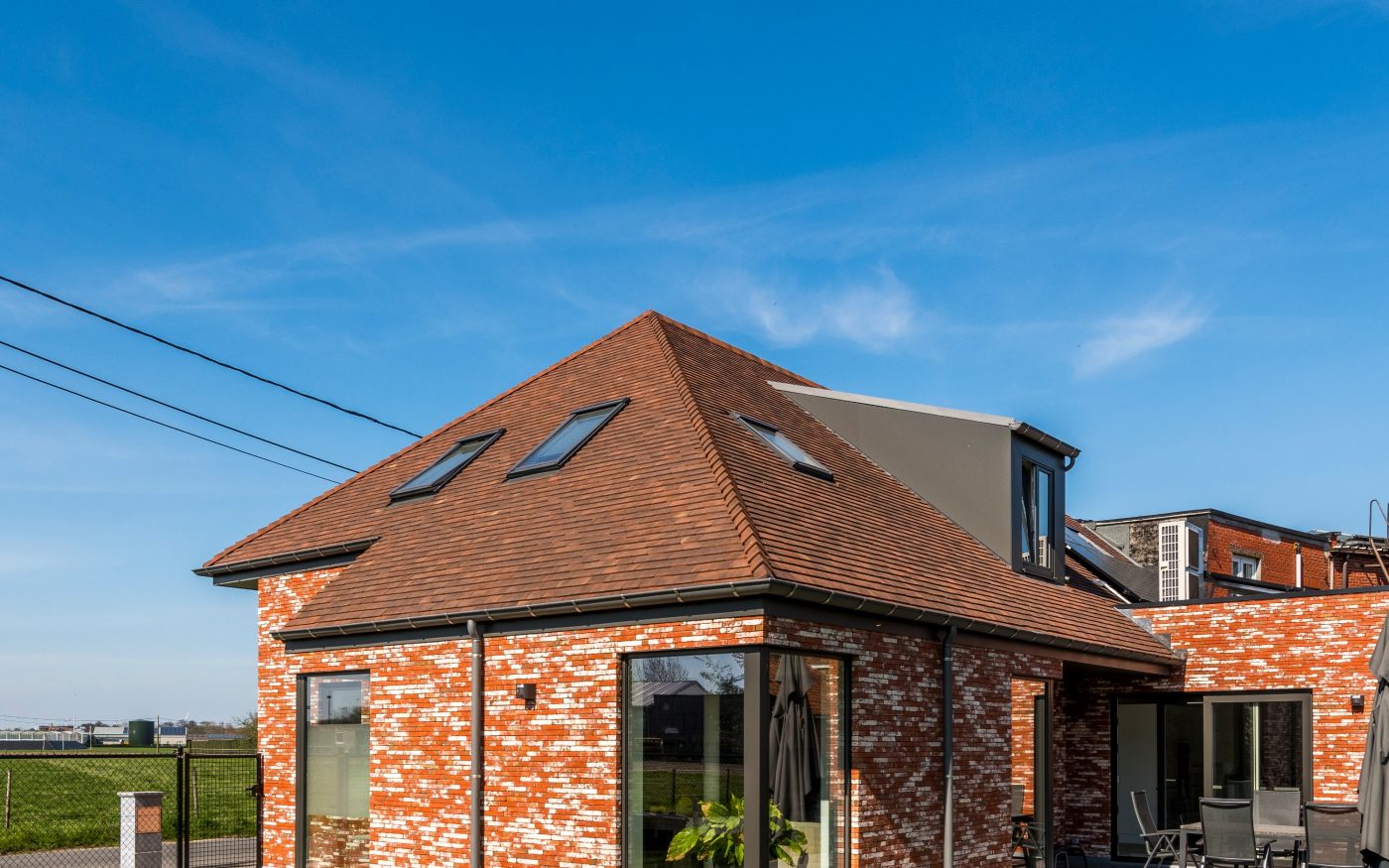 Photo d'une nouvelle construction à Melsele en Belgique avec Métropolis Rouge Atrium Eco-brick