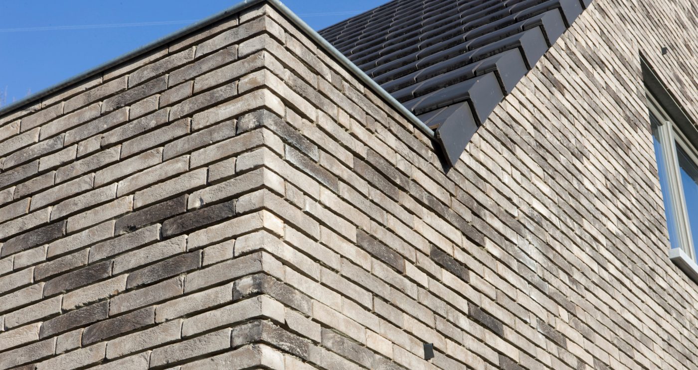 Maison individuelle à Gistel avec la brique Pagus Iluzo gris-noir