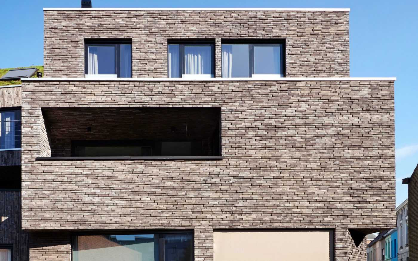 Logements collectifs à Gand avec la brique Pagus gris-noir