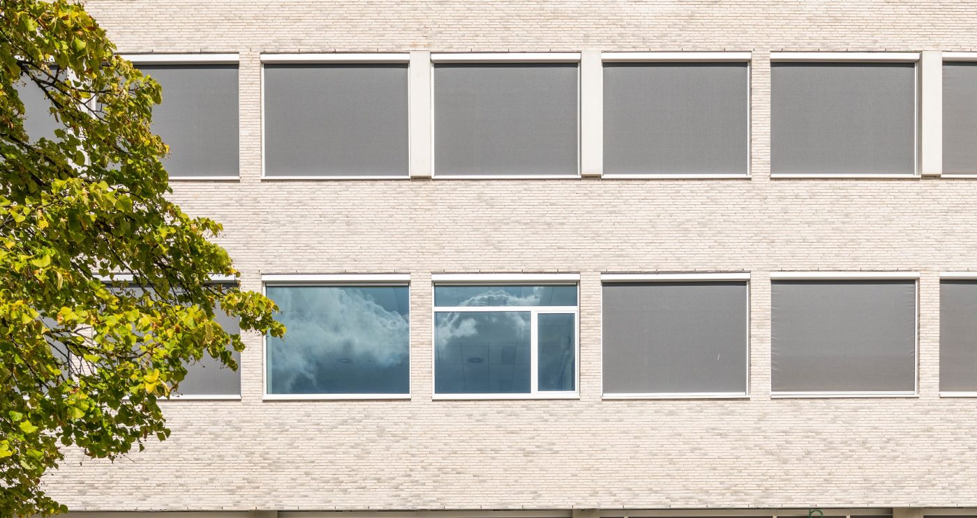 photo d'une Maison individuelle à Frasnez-les-Buissenal, en Belgique avec la collection Metropolis Rouge aula Eco-brick