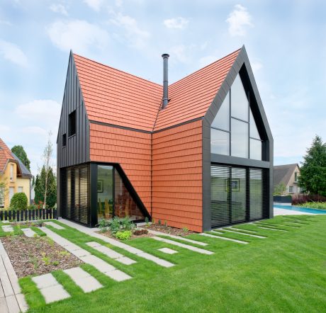 Maison individuelle avec un étage. Toit et façade en tuiles. 15 rue des Coteaux 68920 WETTOLSHEIM. Tuiles Vauban 2 Droite Rouge.