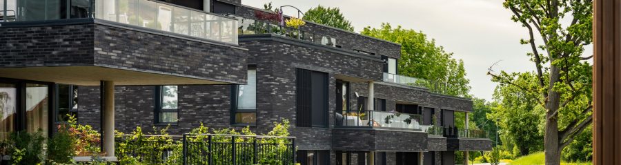 Logement collectif Veritas Have à Asker Norvège avec la brique de parement Terca Linnaeus Noir Graphite