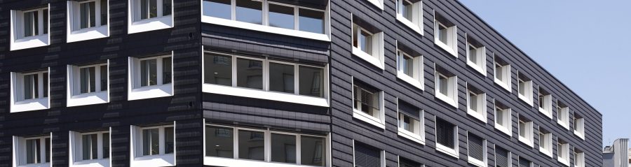 Immeuble de bureaux  avec cinq étages. Mise en œuvre bardage. Immeuble de bureaux Le Lyrol, 13 avenue Lacassagne 69003 LYON. Tuile Koramic Tuile à aspect plat Grand moule Actua Ardoisé.