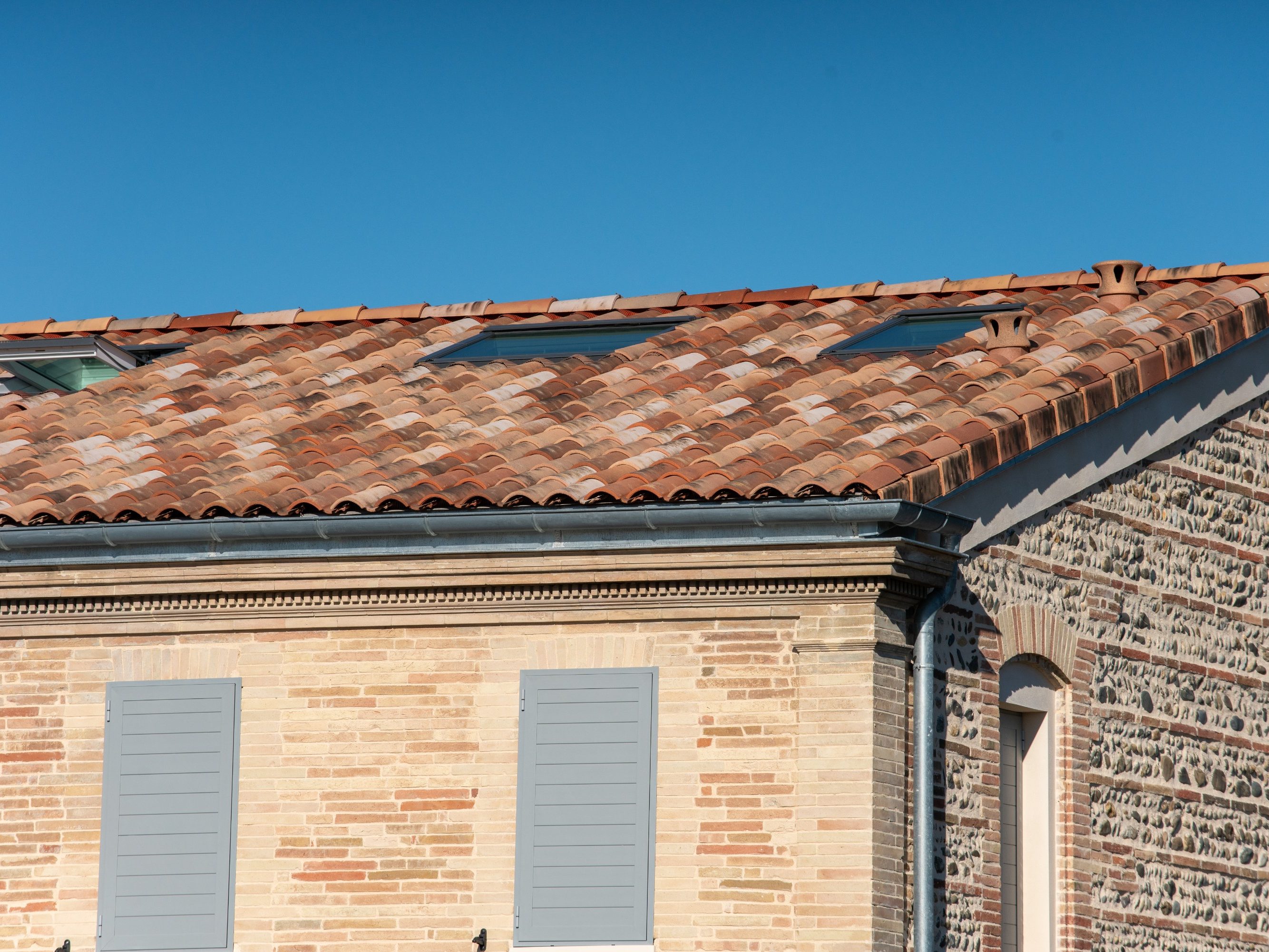 Réhabilitation de cinq logements individuels à Saint Alban rénové avec des tuiles Heritage Canal coloris nuances d'antan