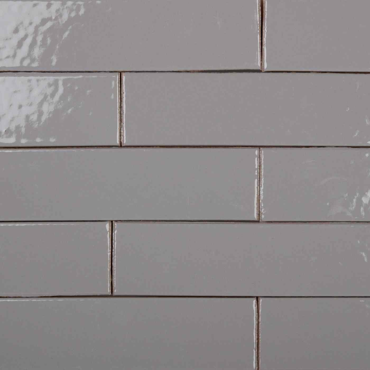 Plaquettes émaillées collées épiderme lisse gris brillant