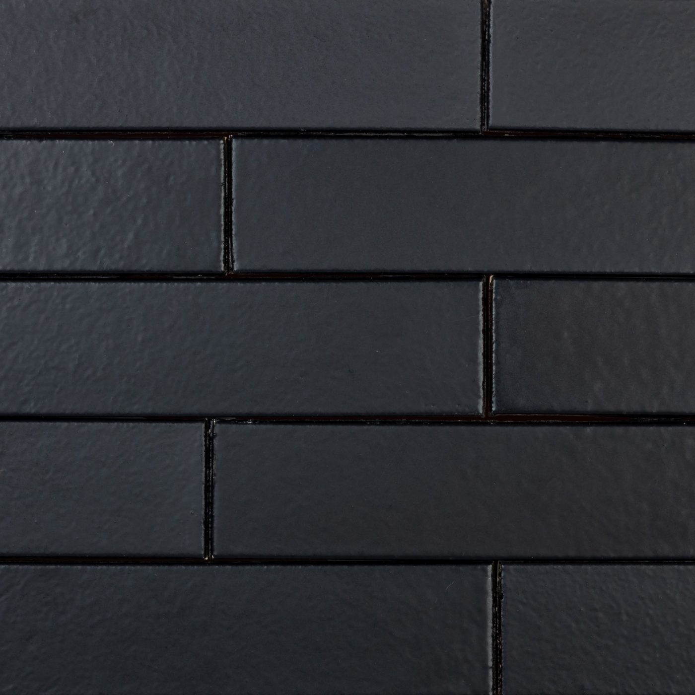 Plaquettes émaillées collées épiderme lisse noir mat